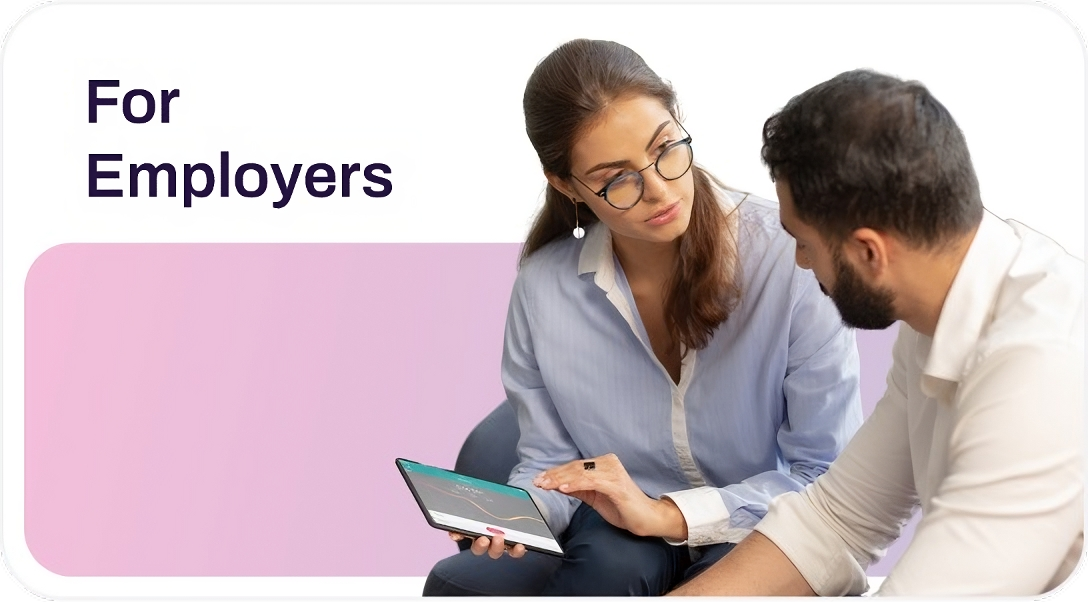 Employers in the Middle East using HR software on a laptop for managing employees.